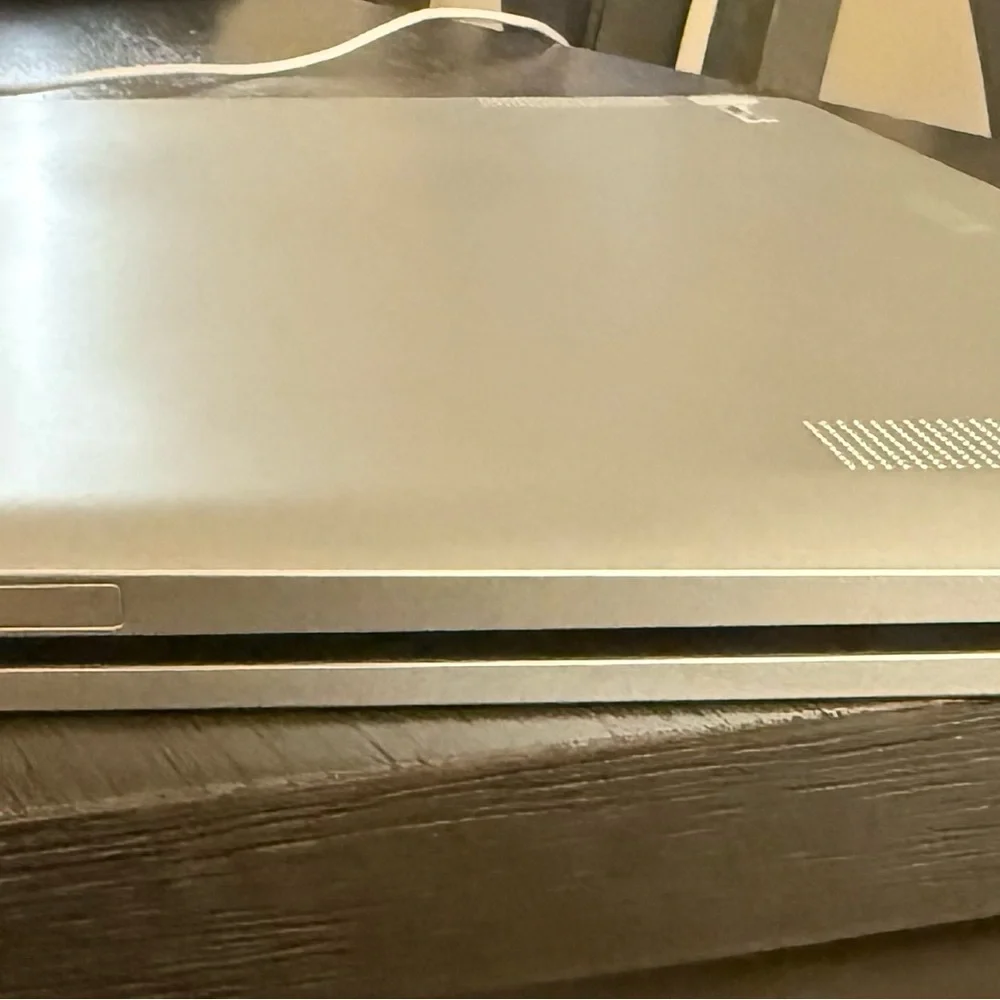 Sleek Black Laptop with Blue Display